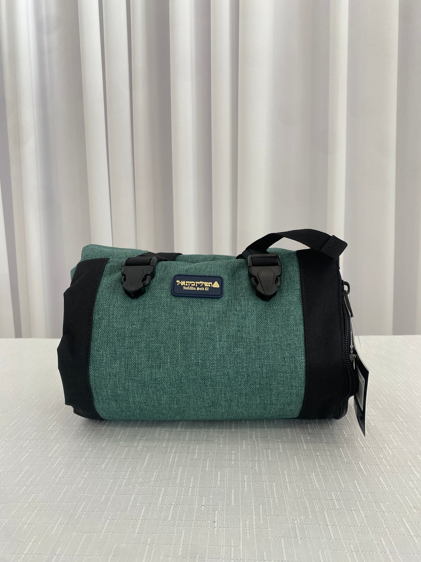 תפידנית בית אל צבע טורקיז